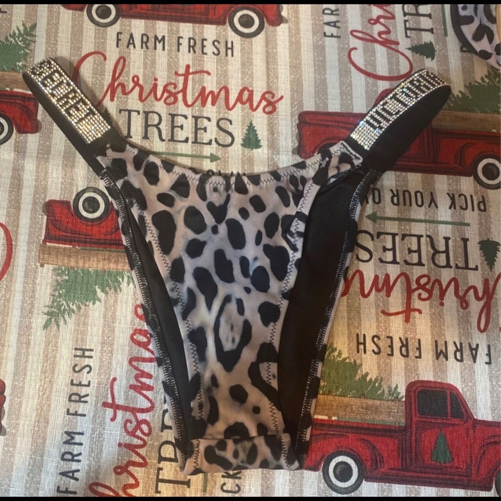 Victoria’s Secret Sparkle strap bathing suit bottoms.